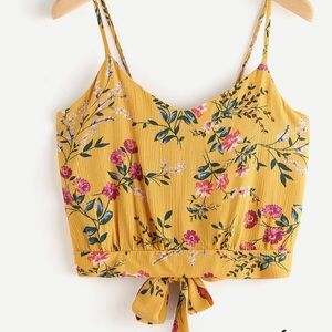 Yellow, floral top with a tied back